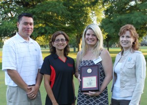 Diana receiving the Northern Illinois University College of Law 2011 Young Alumna of the Year Award